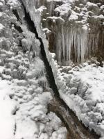 Frozen winter rivulet
