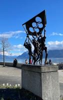 A statue by the lake in front of the Olympic museum in Lausanne
