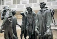 The rain-flecked Les Bourgeois de Calais by Auguste Rodin