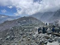 The path stretches before us through shattered rocks and boulders