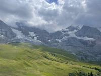 Looking at the cloud-shrouded glaciers of the Jungfrau from the train