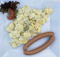 Wienerli and potato salad from restaurant Harz at Atzmännig
