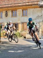 Adi, Urs, and Marco cruise around a turn in Aargau