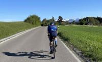 Adi riding toward white mountains
