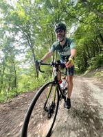 Marco is pretending to enjoy the descent on gravel