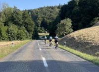 Oli, Adi, and Urs pelt down a hill in Aargau