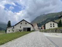 The cobblestoned main street of Hinterrhein