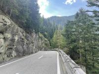 The guardrails are made of wood on this road in Graubünden